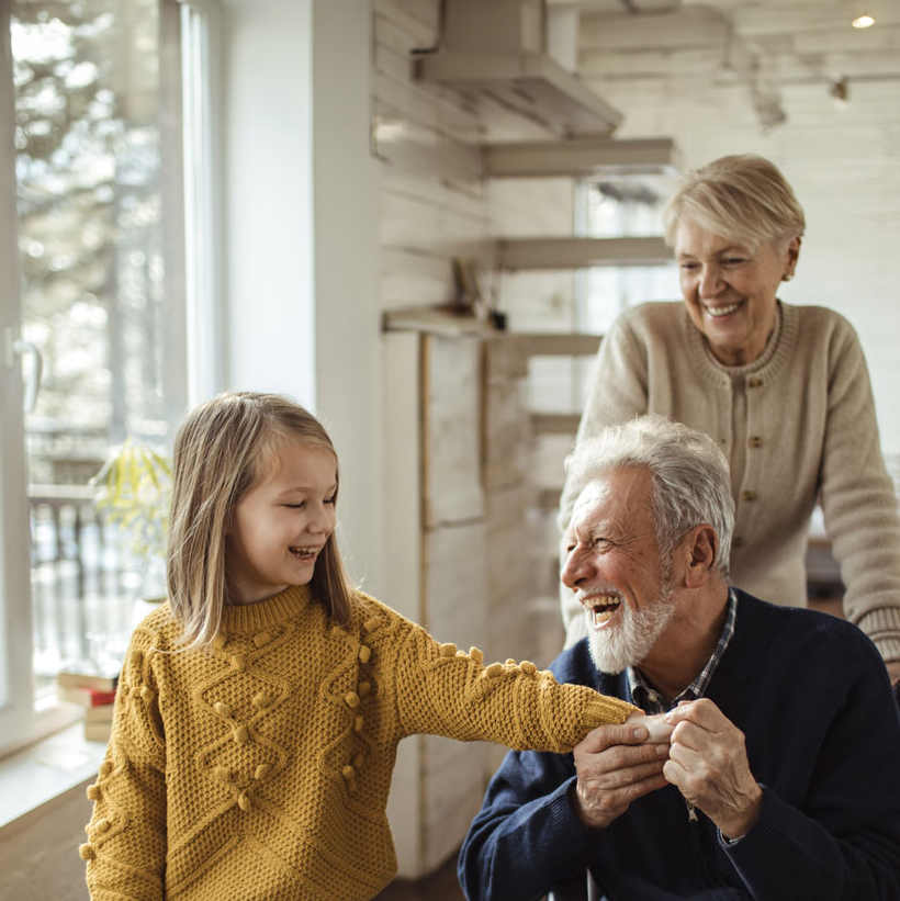 grandparents with grandaughter 